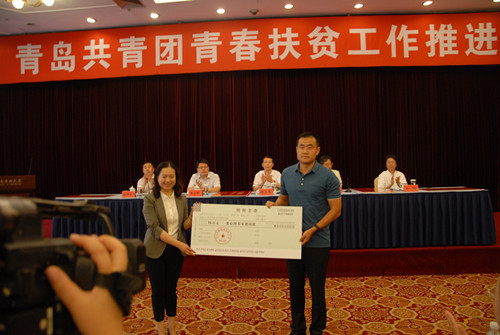 青岛出版集团捐建“城市传媒爱心图书室”_副本.jpg